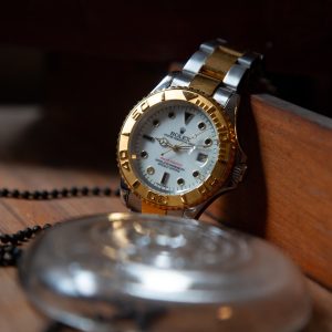 silver and gold rolex watch
